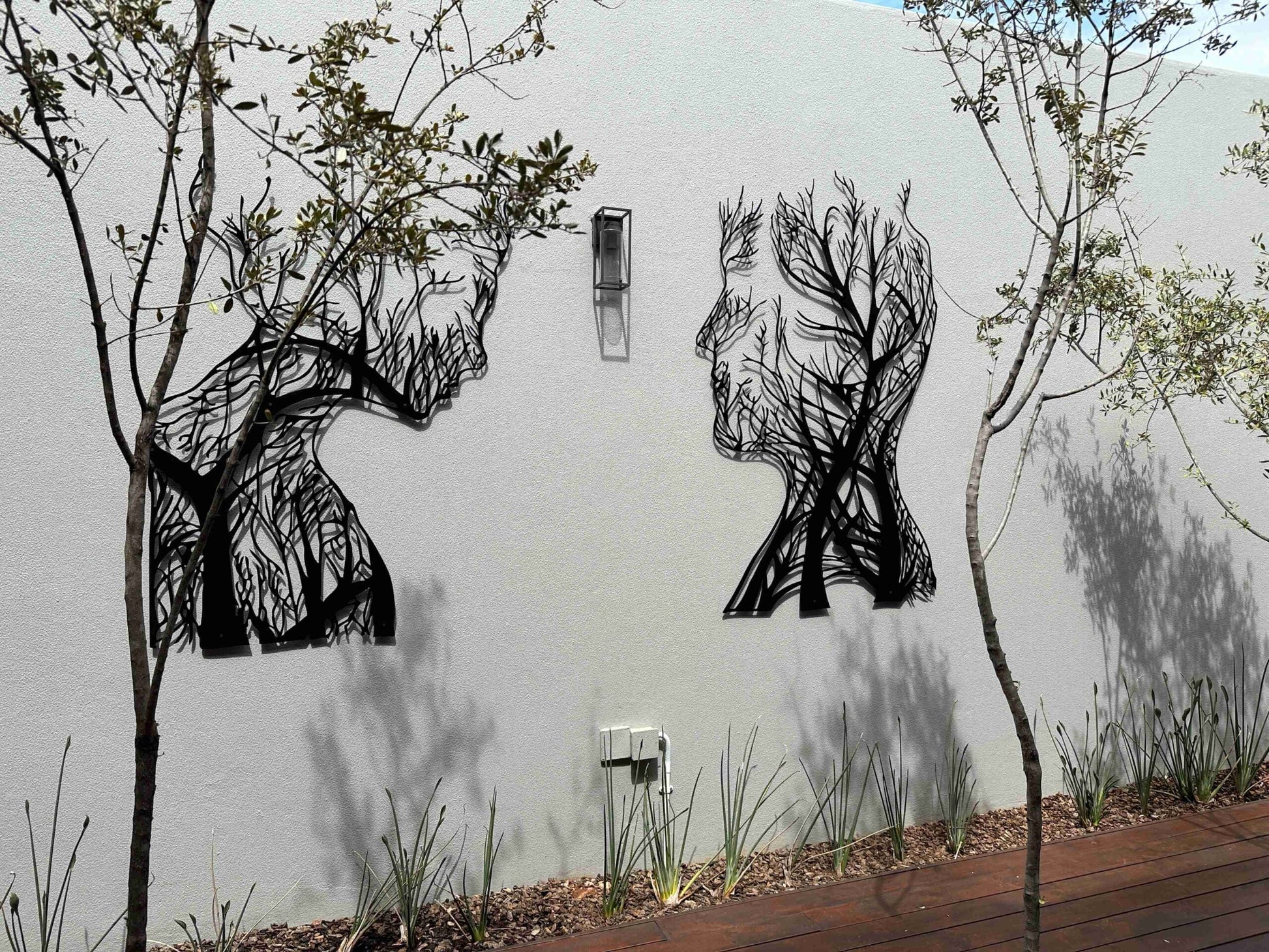 Human in Trees Rooted Metal Wall Art